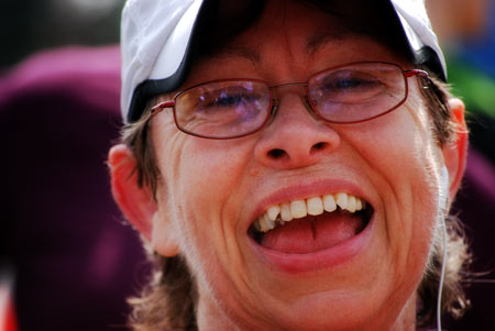 Oh my God she's smiling. What is wrong with this woman?