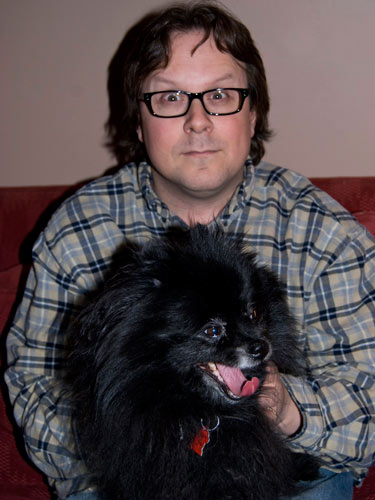 Pixie is a very rare black Pomeranian.