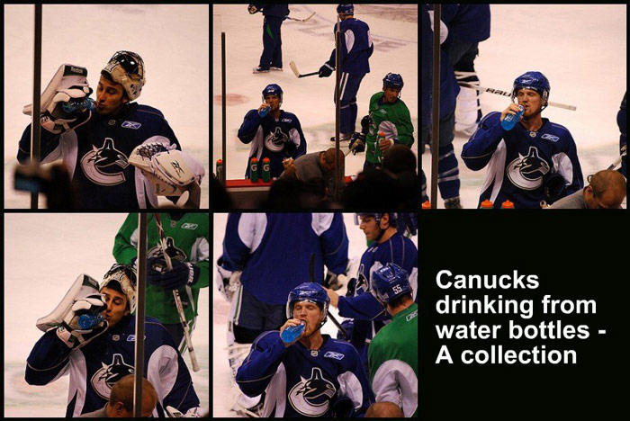 The Canucks drinking from water bottles.